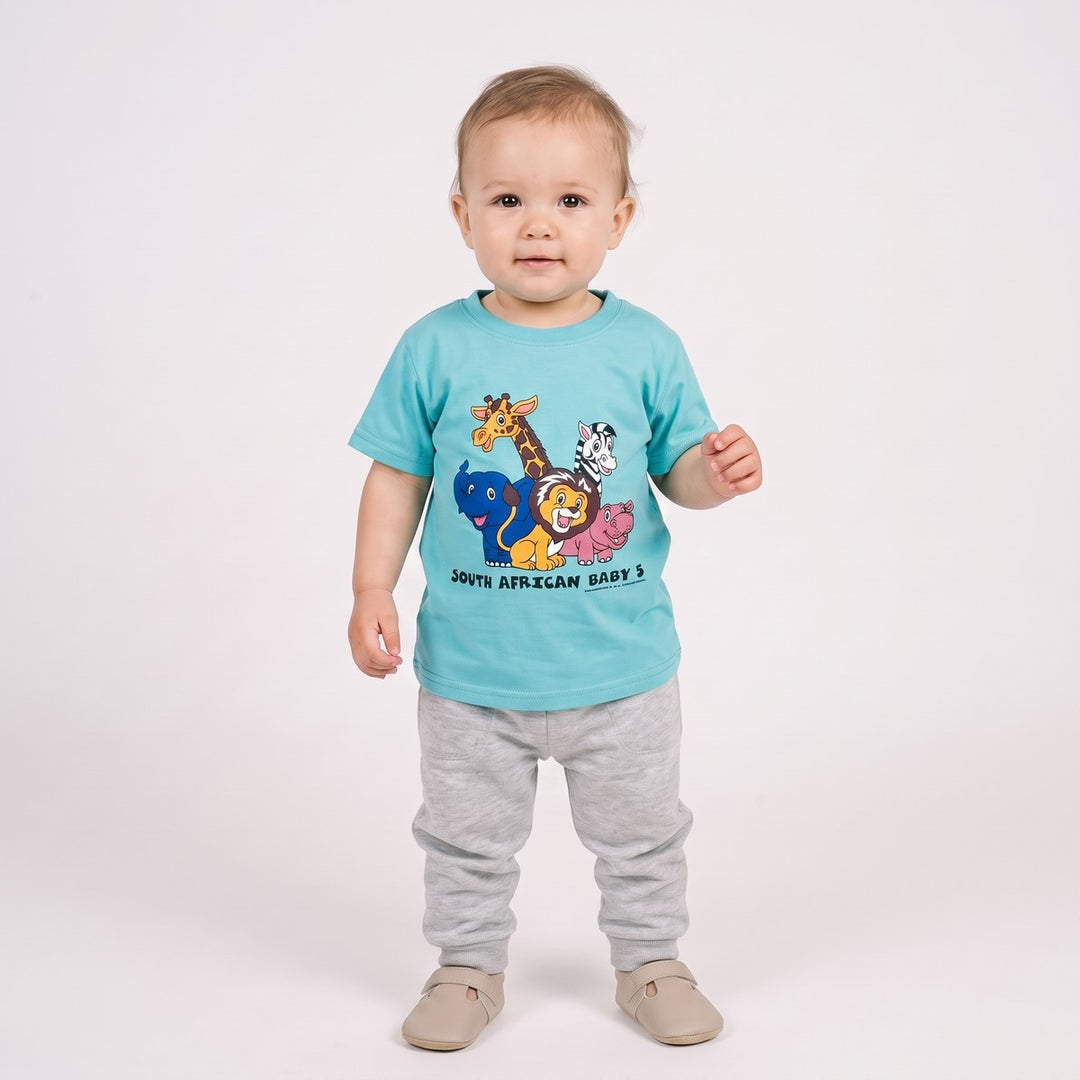 Baby 5 T-Shirt in turquoise, shown full body on an infant, featuring a vibrant cartoon safari animal print.
