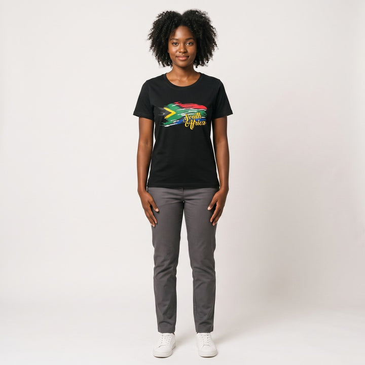 A black short-sleeve t-shirt with a vibrant, stylized South African flag print and "South Africa" in yellow script, front