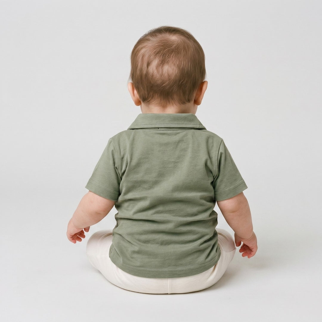 Back view of an olive green Bushbaby Golfer short-sleeved polo shirt, made from a smooth fabric, laid flat.