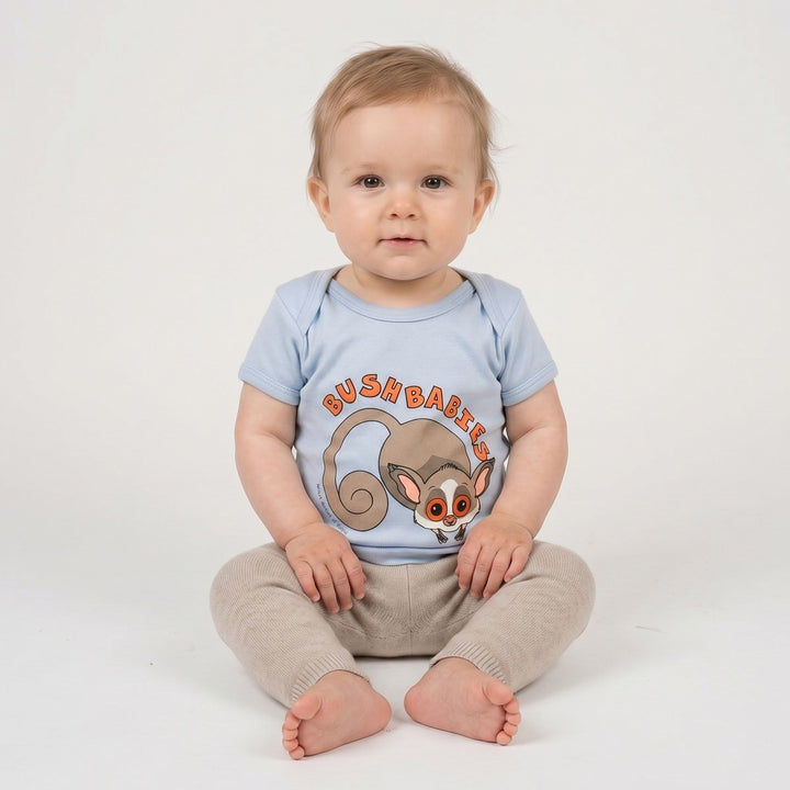 Light blue infant Bushbaby T-shirt featuring a playful cartoon bushbaby graphic and &