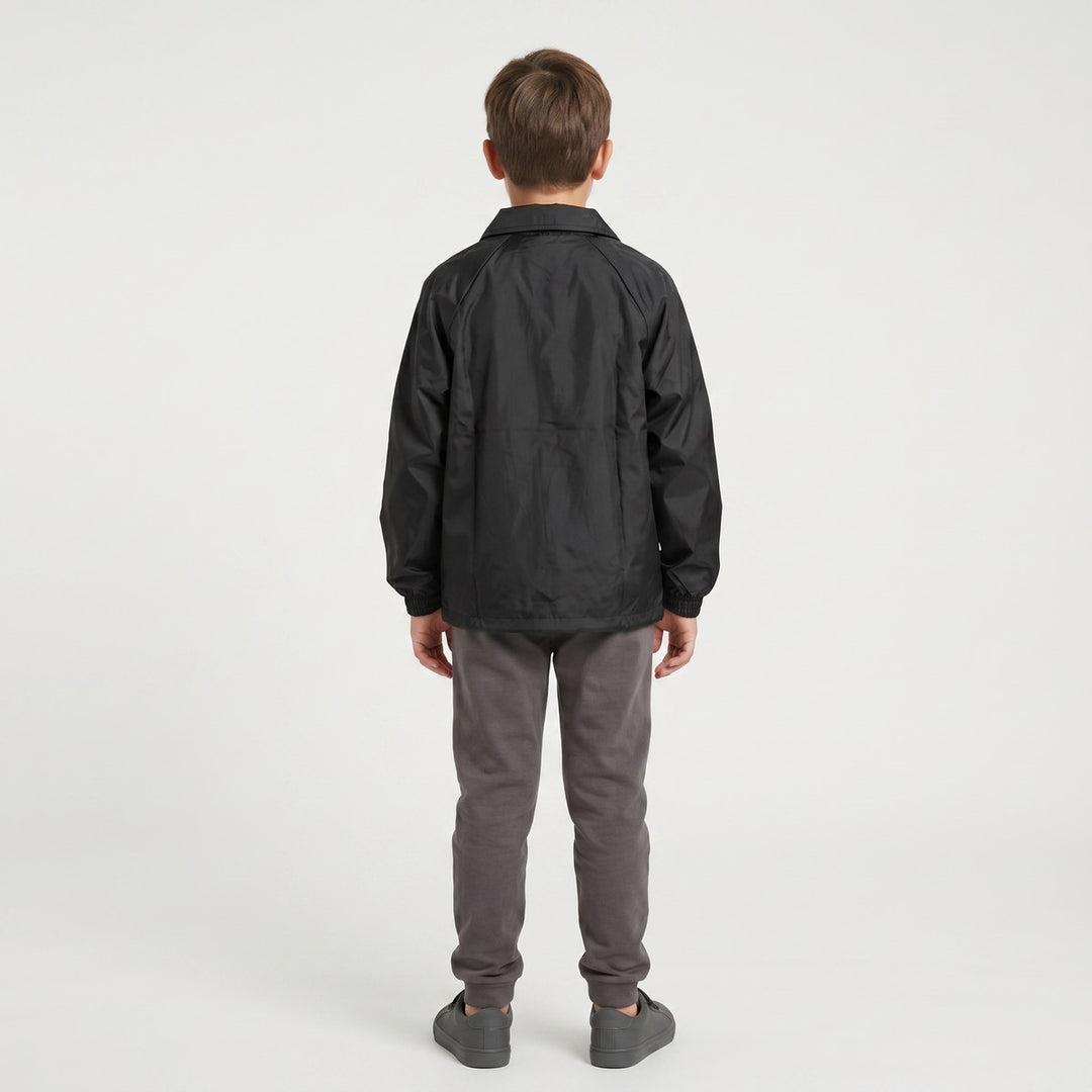 Back view of a black Drimac jacket made from lightweight, slightly crinkled fabric, featuring black drawstrings at the hem.