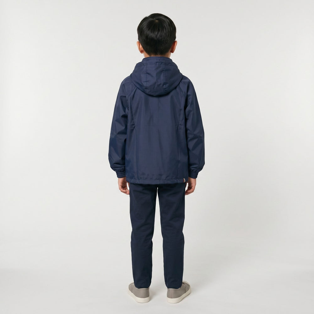 Back view of a navy blue Drimac jacket made from lightweight fabric, featuring a relaxed fit and a drawstring hem.
