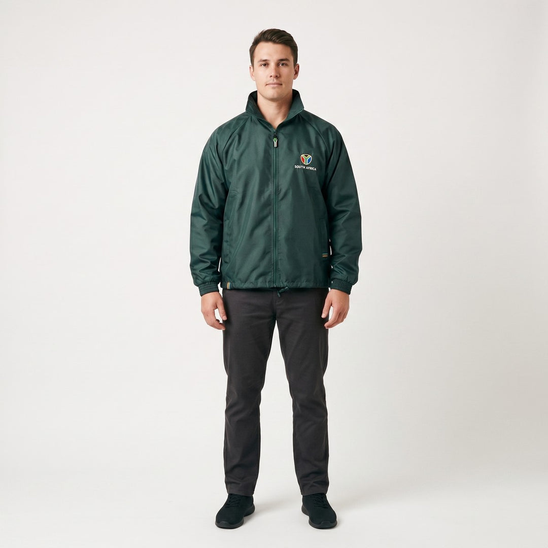 Front view of a dark green Drimac lightweight jacket, featuring a full zipper, high collar, and a 'South Africa' logo with
