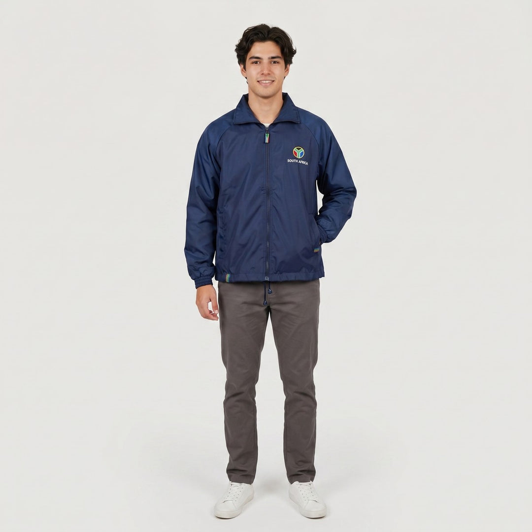 Navy blue Drimac windbreaker jacket with full zip closure, 'SOUTH AFRICA' embroidered logo, and colorful stripe details on