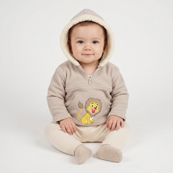 Light beige fleece infant hoodie featuring an embroidered lion design on the front kangaroo pocket and a sherpa-lined hood.