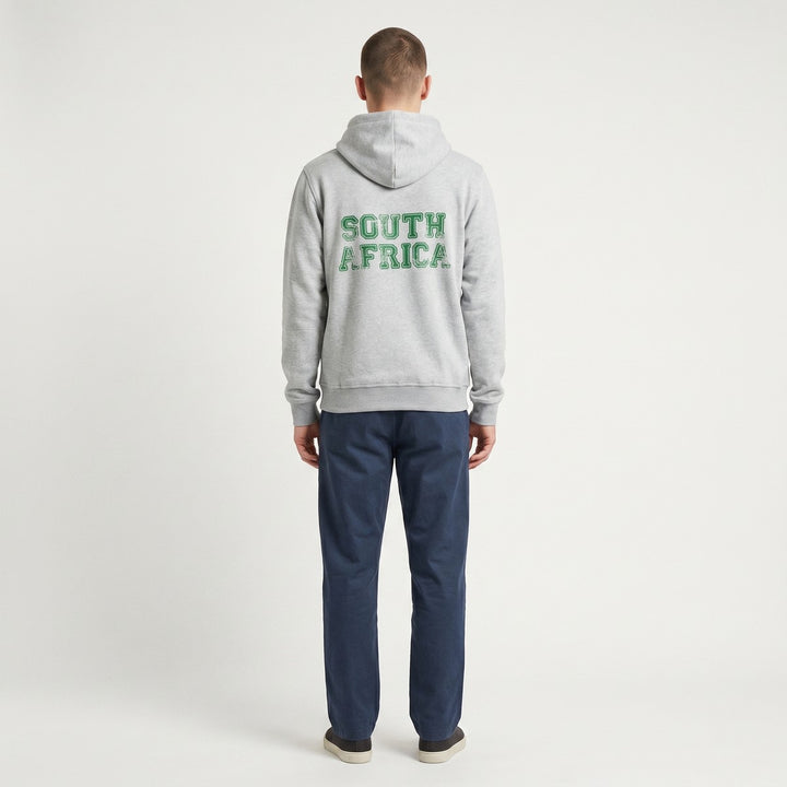 Grey melange hoodie, back view, featuring a distressed green &