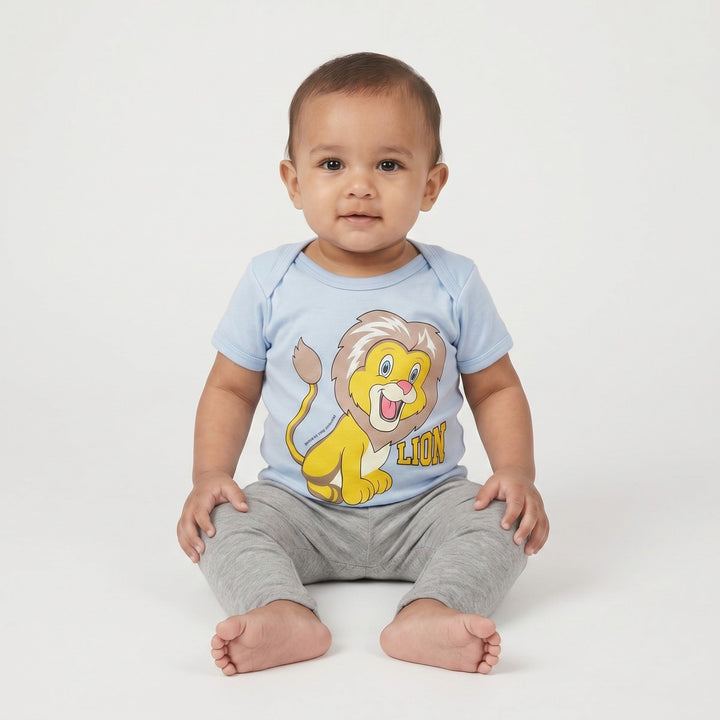 Front view of an infant wearing a light blue short-sleeve Lion T-shirt with a cheerful cartoon lion graphic and &