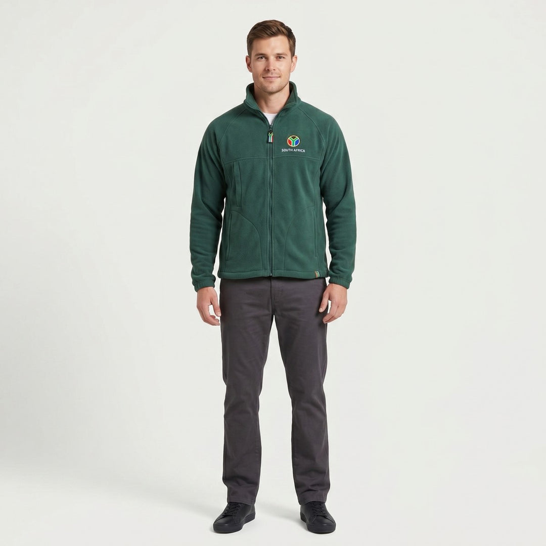 A men's green SA Polar Fleece Jacket, featuring a full-zip front, stand collar, and unique 'SOUTH AFRICA' logo. Displayed on
