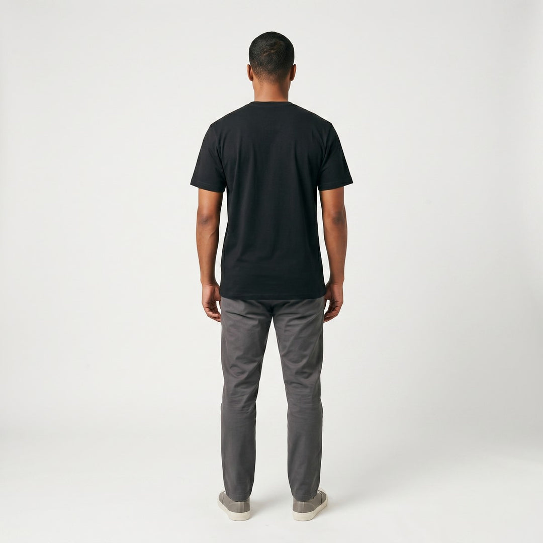 Black SA Flag T-Shirt, back view, made from soft cotton fabric, laid flat on a white surface.