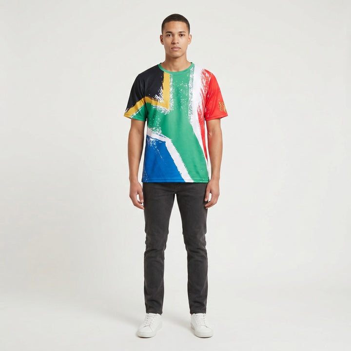 Sublimated T-shirt featuring a vibrant multi-colored South African flag brushstroke design, perfect for casual wear.