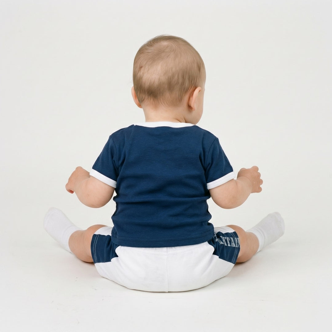 Table Mountain 2 Piece Set for babies, featuring a navy blue short-sleeve t-shirt with white trim and white shorts with navy