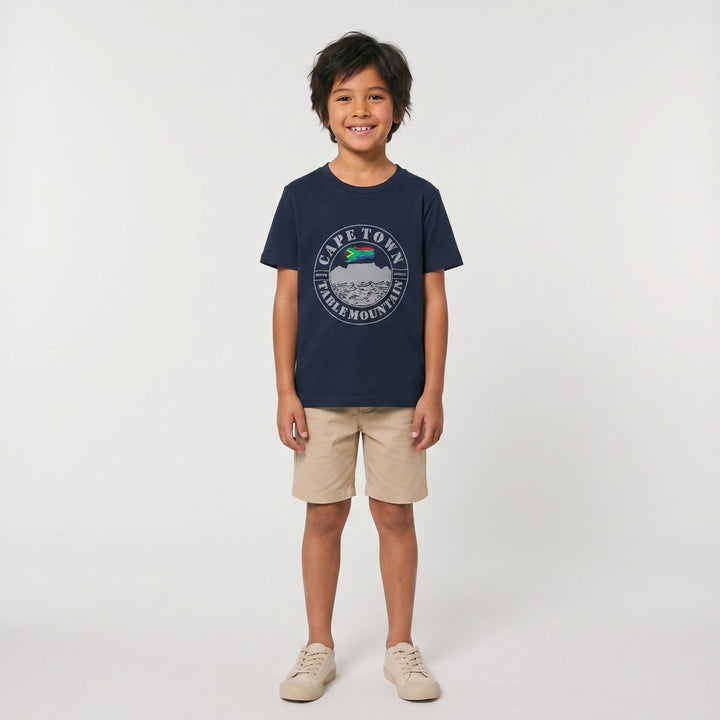 A navy blue short-sleeve Table Mountain T-shirt with a grey circular graphic depicting Table Mountain, waves, and the South